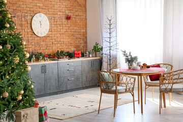Interior of beautiful modern kitchen with Christmas decor