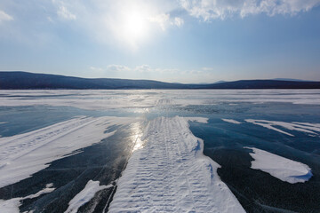Frozen lake in Primorskaya taiga. Sikhote-Alin Biosphere Reserve.