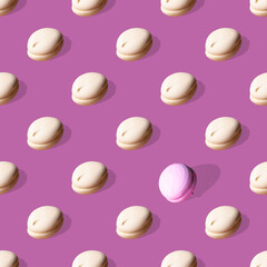 macaroons on lilac background seamless pattern