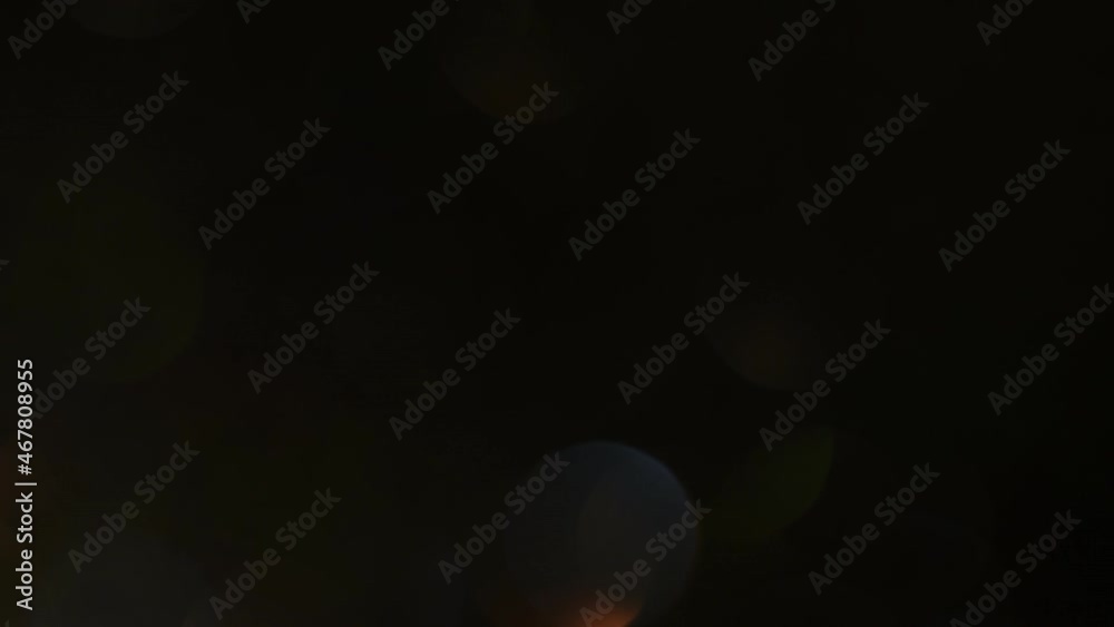Wall mural soft round bokeh moves diagonally down. bokeh hd loop. movement and shimmers of brown bokeh with hig
