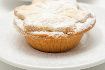 Generously filled with vine fruits, spices and splashes of French brandy and rich ruby port, all encased in shortcrust pastry