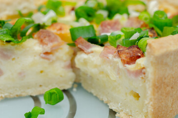 Quiche Lorraine, smoked bacon with medium  and mature cheddar cheese and egg quiche filling in a shortcrust pastry