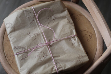 Vintage wrapped gift with string