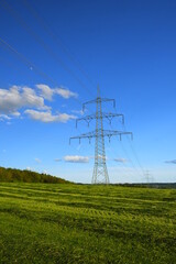 Pylon of the electricity power line.Electricity concept.electricity line. Power lines on blue sky background. High tension power 