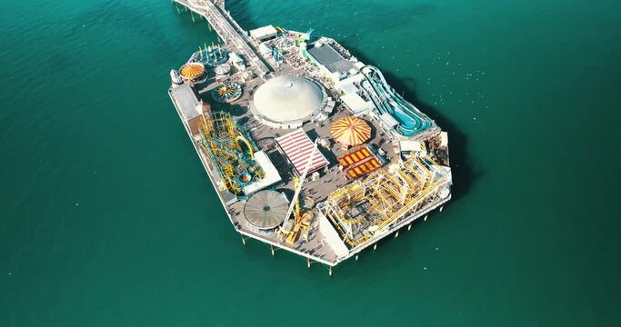Aerial view of new Brighton pier with active fun park in Brighton Great Britain