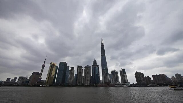 time lapse Shanghai;Lujiazui Financial building;busy Huangpu River shipping.