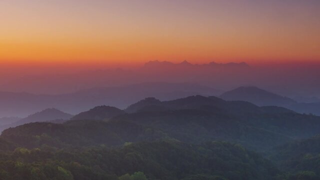 Time Lapse, a lovely winter scene. Beautiful landscape at Doi Kham Fah Viewpoint in Padaeng National Park, Chiang Mai, with Chiang Dao Mountain in the background. One of Thailand's most spectacular.