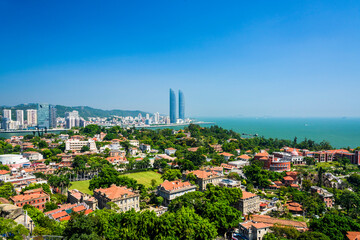 The Gulangyu coastal old building view and the coast of Xiamen modern buildings, China. The place is one of the UNESCO World Heritage.