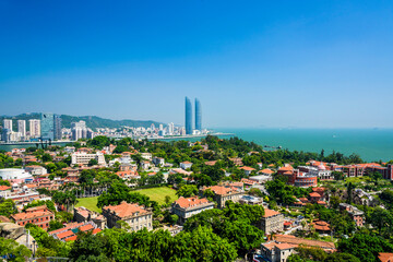 The Gulangyu coastal old building view and the coast of Xiamen modern buildings, China. The place...