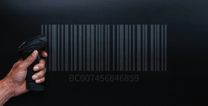 Bar code scanner. Reader laser scanner for warehouse. Retail label barcode scan on dark background. Inventory product business technology. - Powered by Adobe