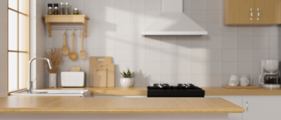 Modern luxury wooden kitchen island over blurred modern Scandinavian kitchen room