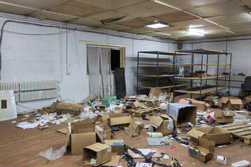abandoned warehouse with scattered boxes