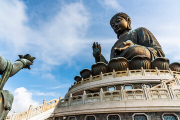 Obraz premium Tian Tan Buddha or Giant Buddha statue at Po Lin Monastery of Ngong Ping in Lantau Island, Hong Kong.