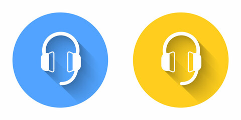 White Headphones icon isolated with long shadow background. Earphones. Concept for listening to music, service, communication and operator. Circle button. Vector