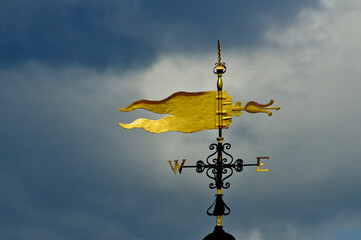 Weathervane and storm clouds, Hampton Court Palace, United Kingdom 