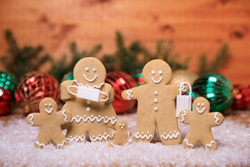 Masked Ginger Bread Family on a Christmas Festive Background