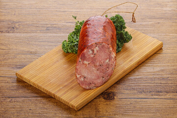 Pork ham sausage over board