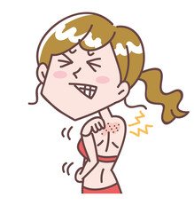 背中が乾燥して痒い女性