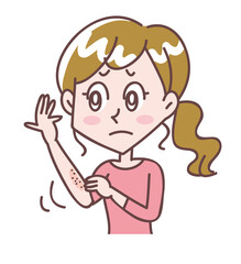 腕が乾燥して痒い女性