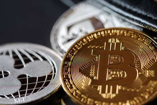 Maesot, Thailand- June 5, 2021:Close-up of a cryptocurrency coin gold, New concept crypto currency virtual money is the future of digital currency online financial payments.