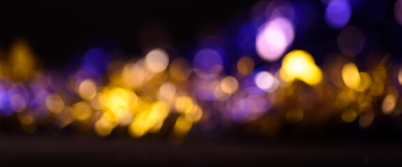Abstract of bokeh blur banner background, pink purple blue and gold color de focused