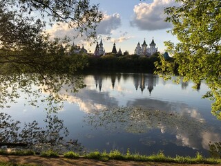 
izmailovsky kremlin on the background of a pond