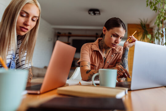 Loving couple working from home