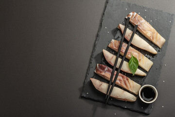 Raw pollock (Pollachius virens) pieces. Fresh fish for healthy food lifestyle