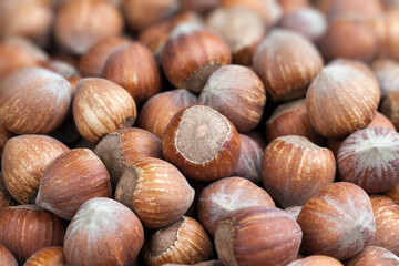 whole hazelnuts on a wooden table,in shell