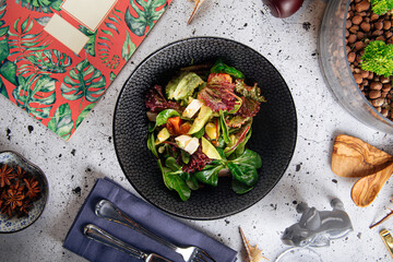 Gourmet mediterranean healthy salad on decorated background