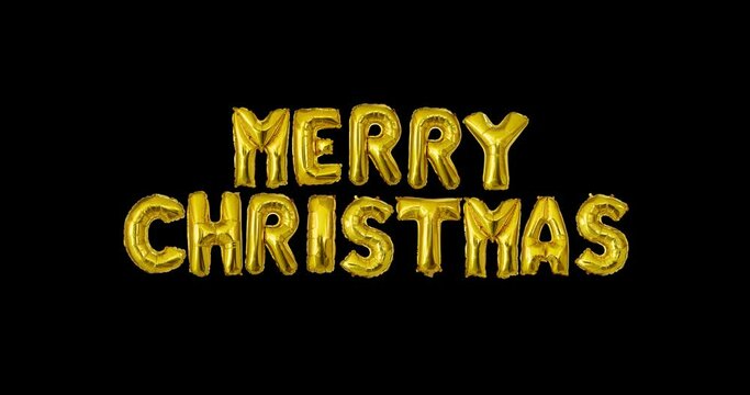 Merry Christmas Balloon Letters Floating on Isolated Black Background