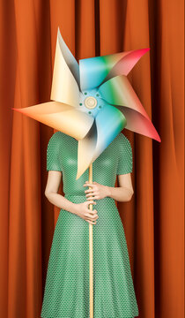 Digitally generated image of woman holding pinwheel toy