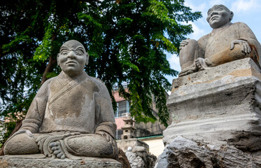 Statues at Wat Suthat Temple in Bangkok Thailand