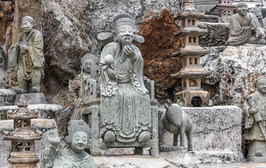 Statue garden at Wat Suthat Temple in Bangkok Thailand