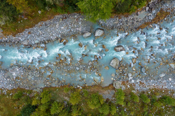 Drone view of Ova da Morteratsch river flowing through Val Morteratsch