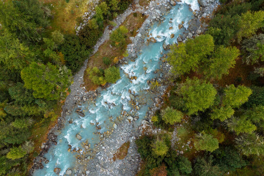 Drone view of Ova da Morteratsch river flowing through Val Morteratsch