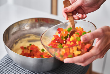 Woman cooking cake at kitchen