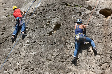 Climbers on a granite wall. Extreme sport. Outdoor activity