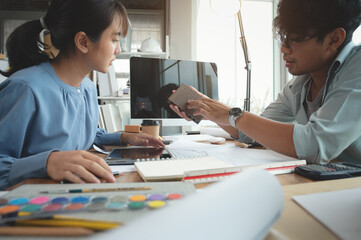 Architects and interior designers woman discussing about concept of building design. Estimation for...