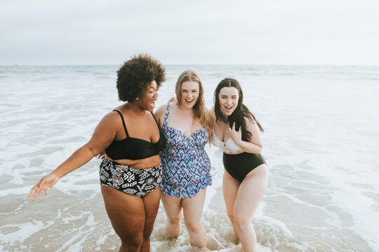 Gorgeous Women Enjoying The Beach