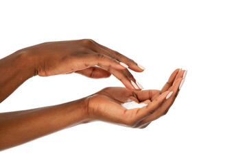 Close up of black woman hands with moisturizer cream