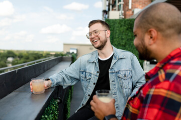 Happy man having cocktail while on a date