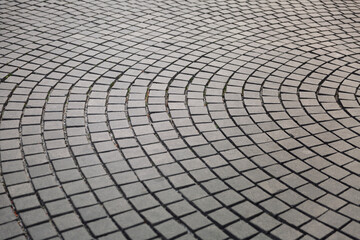 Drawing of a gray cobblestone city pavement. Close-up. Background. Space for text.