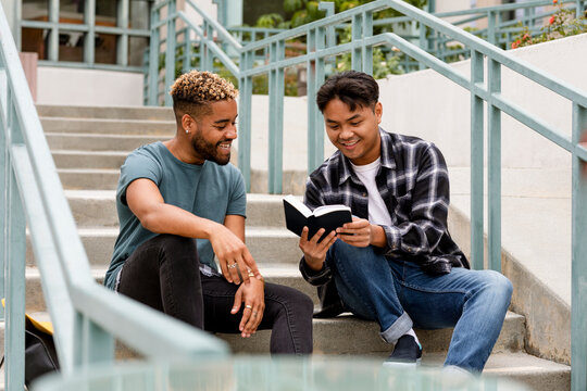 Diverse students studying together at college campus