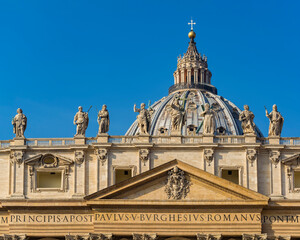 Fototapeta premium A view of main facade and dome of St. Peter's Basilica in the Vatican city, Rome, Italy