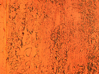 beautiful background of an old solid metal garage wall with corrosion and rust