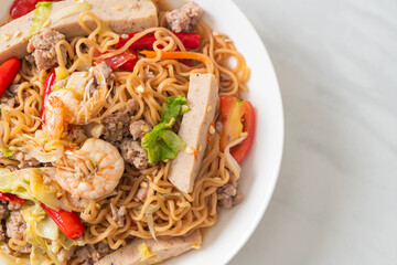 Instant noodles spicy salad on plate
