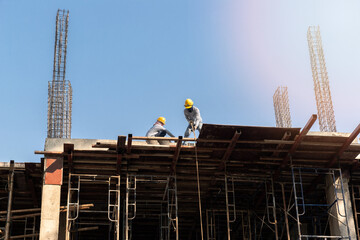 Naklejka premium Construction workers or builder workers working on contruction site.