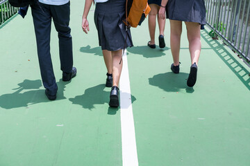 Obraz premium Students on their way home from school