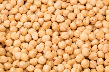 Peeled hazelnuts. Large hazelnut. A lot of nuts close up.